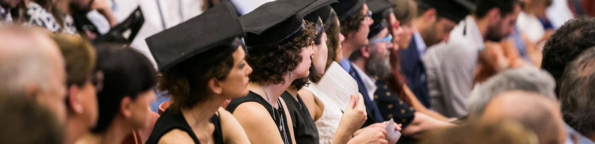 graduates with graduation cap